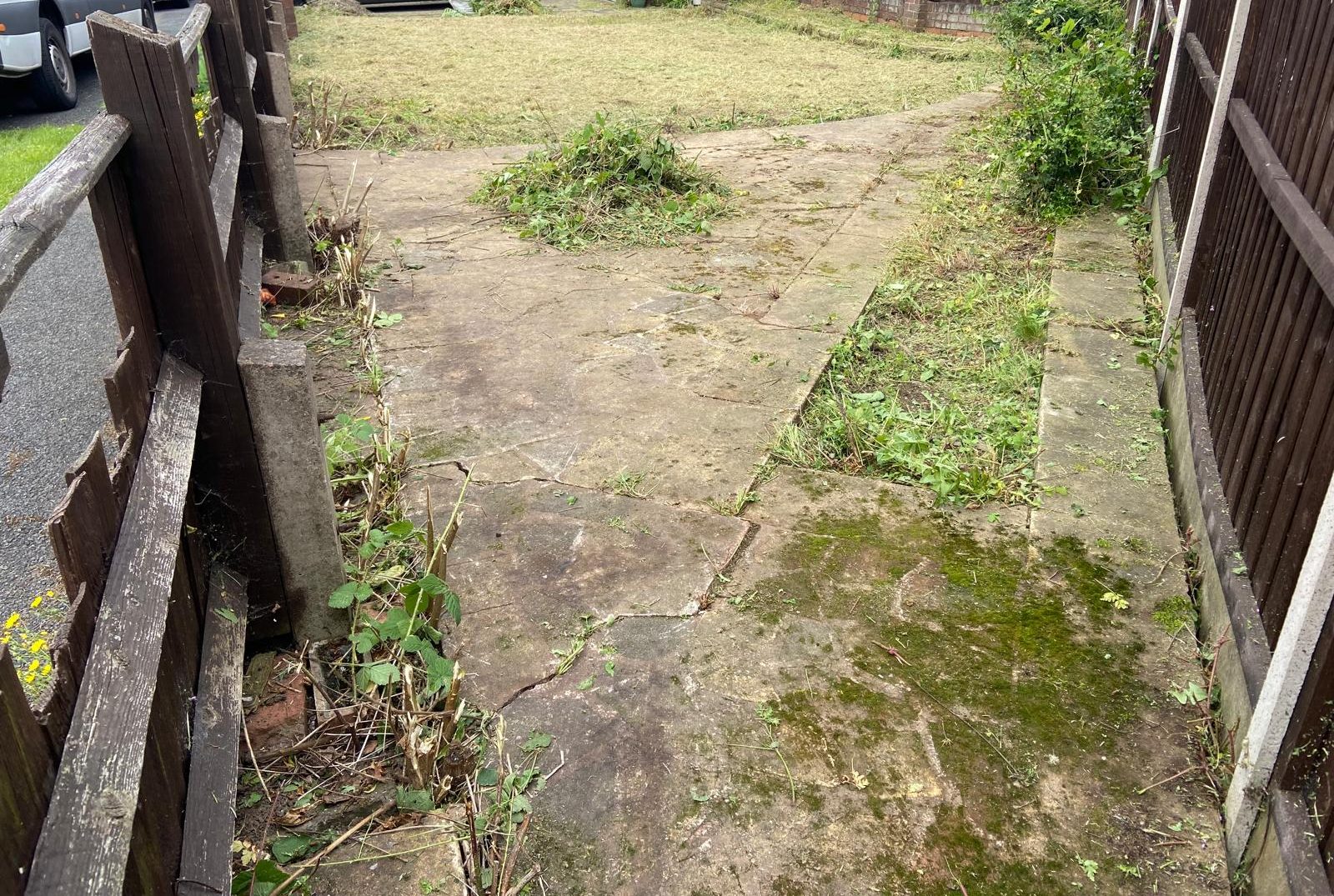 Paving cleared and edges cut back after the job